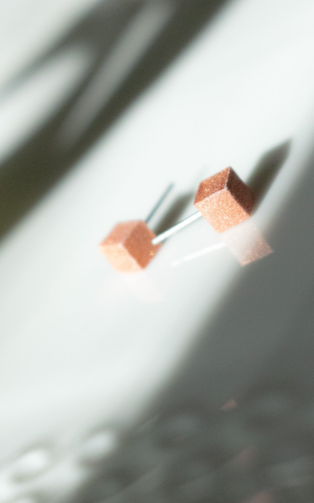 Cubic ear studs